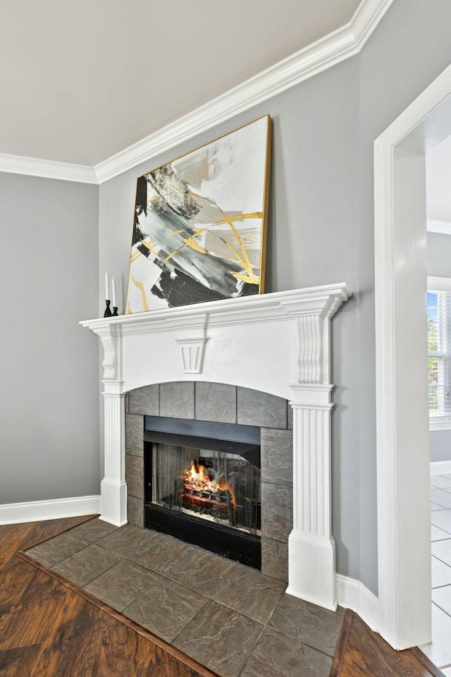 5239 Starnes Dr, Murfreesboro, TN 37128 - detailed view of a fireplace, ornamental molding, baseboards, and wood finished floors