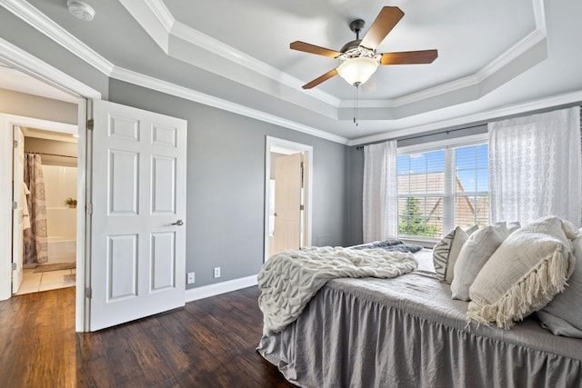 5239 Starnes Dr, Murfreesboro, TN 37128 - bedroom featuring a raised ceiling, wood finished floors, crown molding, baseboards, and ensuite bathroom