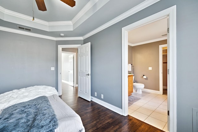 5239 Starnes Dr, Murfreesboro, TN 37128 - bedroom featuring a tray ceiling, baseboards, crown molding, wood finished floors, and a ceiling fan