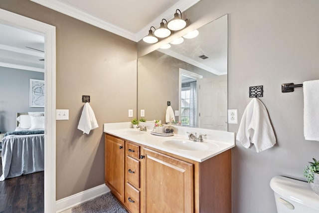 5239 Starnes Dr, Murfreesboro, TN 37128 - ensuite bathroom featuring crown molding, double vanity, baseboards, and toilet