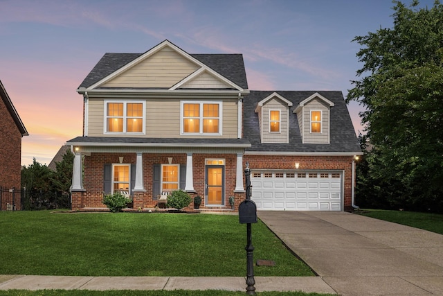 5239 Starnes Dr, Murfreesboro, TN 37128 - view of front facade featuring a porch, concrete driveway, brick siding, an attached garage, and roof with shingles