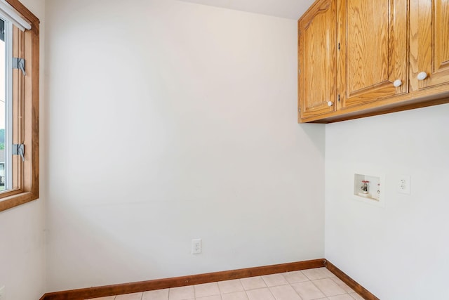 1634 Falling Water Rd, Sparta, TN 38583 - washroom featuring cabinet space, baseboards, washer hookup, and healthy amount of natural light