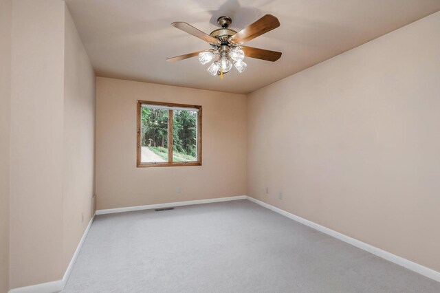 1634 Falling Water Rd, Sparta, TN 38583 - unfurnished room featuring carpet, baseboards, and ceiling fan