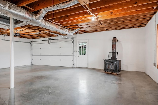 1634 Falling Water Rd, Sparta, TN 38583 - garage featuring a wood stove