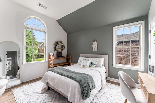 115 Wise Rd, Franklin, TN 37064 - bedroom with wood finished floors, vaulted ceiling, and baseboards
