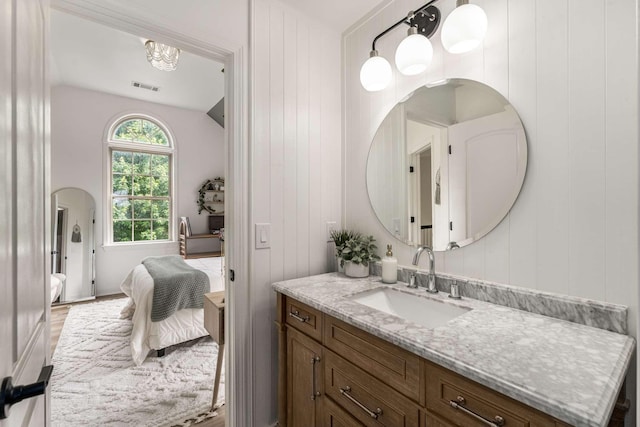 115 Wise Rd, Franklin, TN 37064 - bathroom featuring vanity, wood finished floors, and connected bathroom
