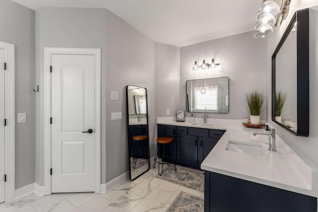 115 Wise Rd, Franklin, TN 37064 - bathroom with marble finish flooring, double vanity, and baseboards