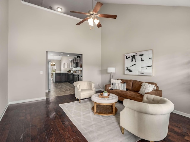 3031 Joseph Dr, Spring Hill, TN 37174 - living area with high vaulted ceiling, baseboards, dark wood-style floors, and a ceiling fan