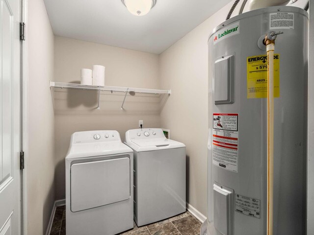 3031 Joseph Dr, Spring Hill, TN 37174 - washroom with electric water heater, independent washer and dryer, and baseboards