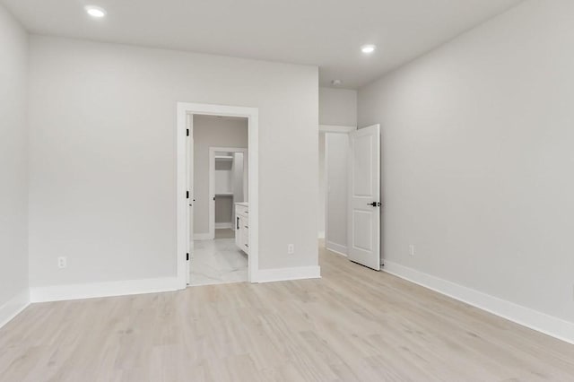 363 S Walnut Ave, Cookeville, TN 38501 - unfurnished bedroom with recessed lighting, baseboards, and light wood-style flooring