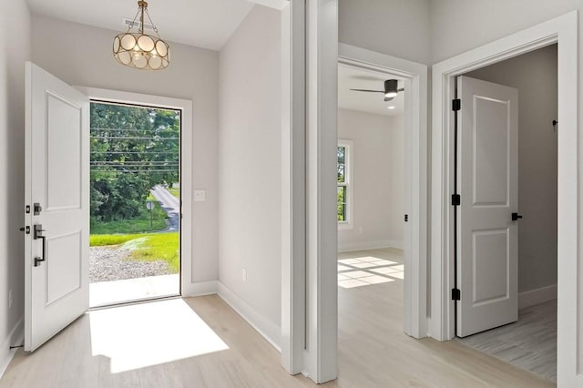 363 S Walnut Ave, Cookeville, TN 38501 - entrance foyer featuring light wood-style floors, baseboards, and a chandelier
