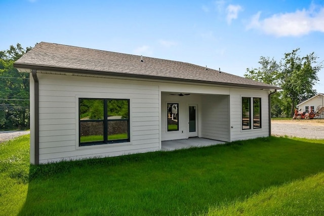 363 S Walnut Ave, Cookeville, TN 38501 - back of property featuring a yard, a ceiling fan, and roof with shingles