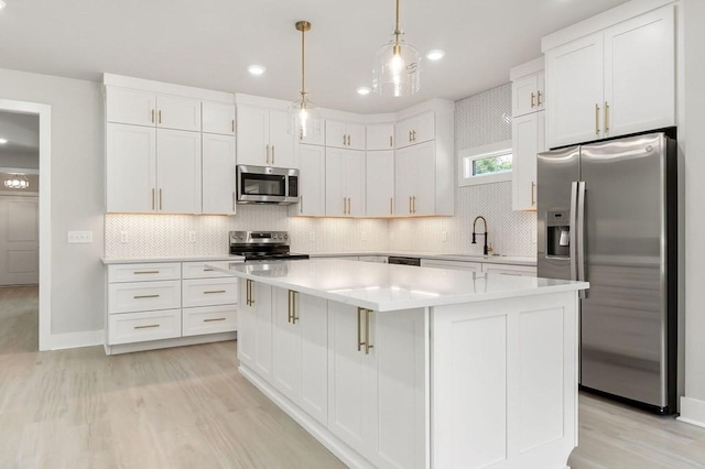 363 S Walnut Ave, Cookeville, TN 38501 - kitchen with stainless steel appliances, a sink, white cabinetry, decorative backsplash, and recessed lighting