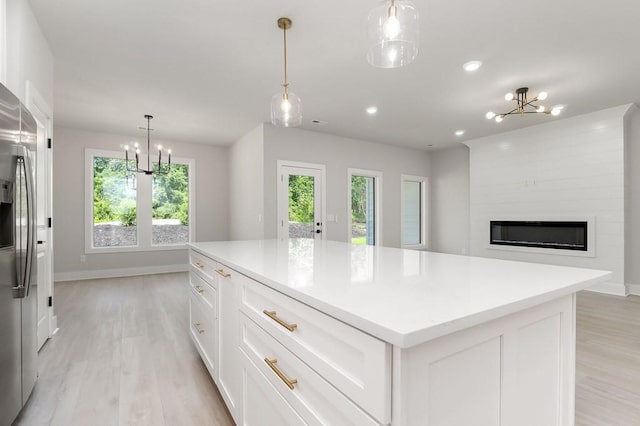 363 S Walnut Ave, Cookeville, TN 38501 - kitchen featuring a chandelier, light wood-style flooring, healthy amount of natural light, and recessed lighting