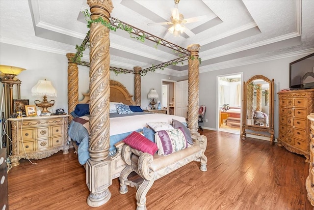 431 Jack Thomas Dr, Manchester, TN 37355 - bedroom featuring a tray ceiling, wood finished floors, ornamental molding, baseboards, and ceiling fan