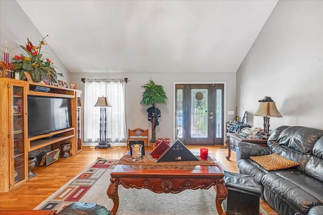 431 Jack Thomas Dr, Manchester, TN 37355 - living room featuring vaulted ceiling and wood finished floors