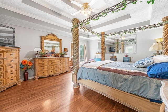 431 Jack Thomas Dr, Manchester, TN 37355 - bedroom featuring a raised ceiling, ornamental molding, wood finished floors, access to outside, and ceiling fan
