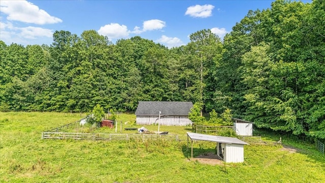 431 Jack Thomas Dr, Manchester, TN 37355 - view of yard featuring an outbuilding and a view of trees
