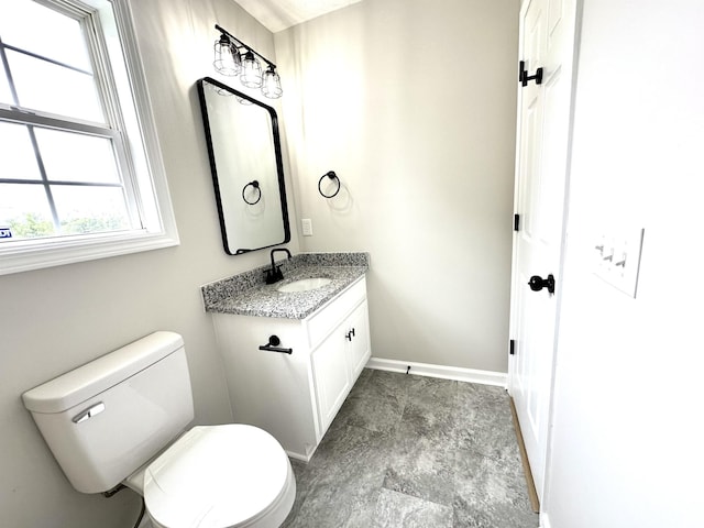 115 Briley Ln, Portland, TN 37148 - bathroom featuring vanity, toilet, and baseboards