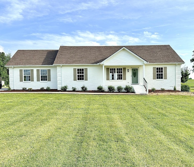 115 Briley Ln, Portland, TN 37148 - single story home featuring brick siding, a front yard, and roof with shingles