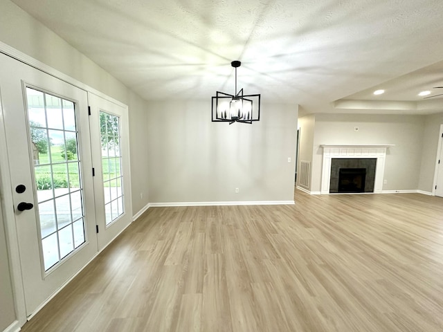 115 Briley Ln, Portland, TN 37148 - unfurnished dining area featuring baseboards, light wood-type flooring, recessed lighting, a chandelier, and a fireplace