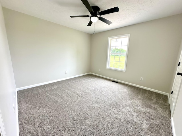 115 Briley Ln, Portland, TN 37148 - empty room with ceiling fan, carpet floors, baseboards, and a textured ceiling