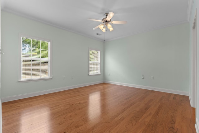 226 Wrennewood Ln, Franklin, TN 37064 - spare room featuring crown molding, a ceiling fan, light wood-type flooring, and baseboards