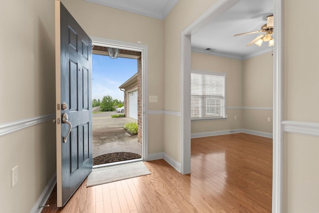 226 Wrennewood Ln, Franklin, TN 37064 - entryway featuring healthy amount of natural light, light wood-style flooring, crown molding, baseboards, and a ceiling fan