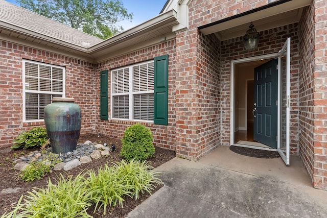 226 Wrennewood Ln, Franklin, TN 37064 - property entrance with brick siding and roof with shingles