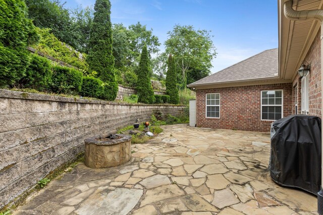 226 Wrennewood Ln, Franklin, TN 37064 - fenced backyard with a patio area