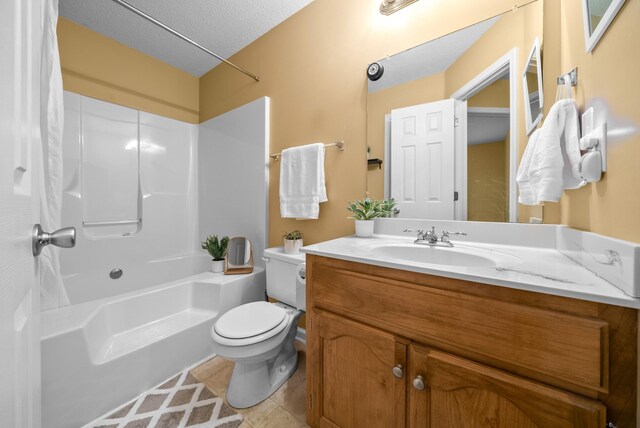 3700 Wheatfield Ln, Clarksville, TN 37040 - bathroom with toilet, shower / bath combination, vanity, tile patterned floors, and a textured ceiling