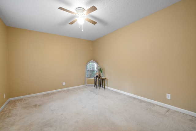 3700 Wheatfield Ln, Clarksville, TN 37040 - unfurnished room with light colored carpet, a ceiling fan, and baseboards