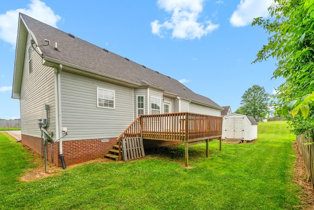 3700 Wheatfield Ln, Clarksville, TN 37040 - back of property with a wooden deck, roof with shingles, a lawn, crawl space, and stairs