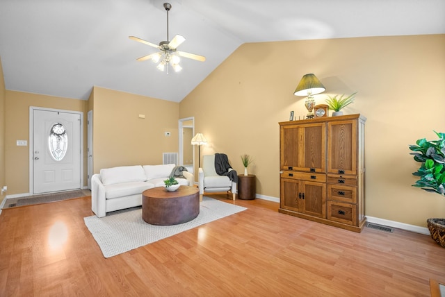 3700 Wheatfield Ln, Clarksville, TN 37040 - living room with a ceiling fan, light wood-style flooring, baseboards, and high vaulted ceiling