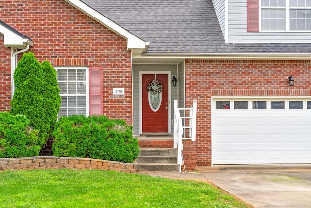 3700 Wheatfield Ln, Clarksville, TN 37040 - property entrance featuring brick siding, driveway, and a shingled roof