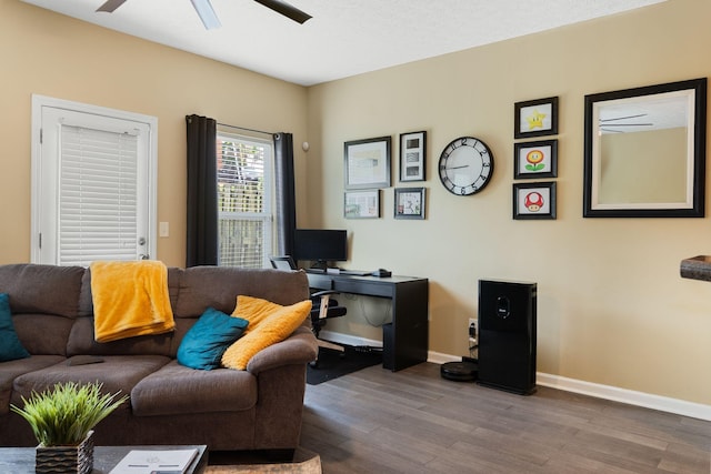 1515 Bridgecrest Dr Unit 220, Antioch, TN 37013 - living room with wood finished floors, ceiling fan, and baseboards