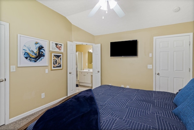 1515 Bridgecrest Dr Unit 220, Antioch, TN 37013 - carpeted bedroom featuring vaulted ceiling, baseboards, connected bathroom, and ceiling fan