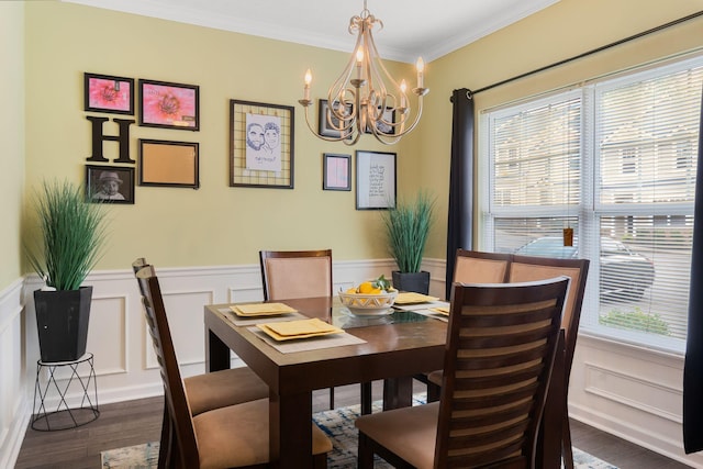 1515 Bridgecrest Dr Unit 220, Antioch, TN 37013 - dining space with a chandelier, dark wood-style floors, ornamental molding, a decorative wall, and wainscoting