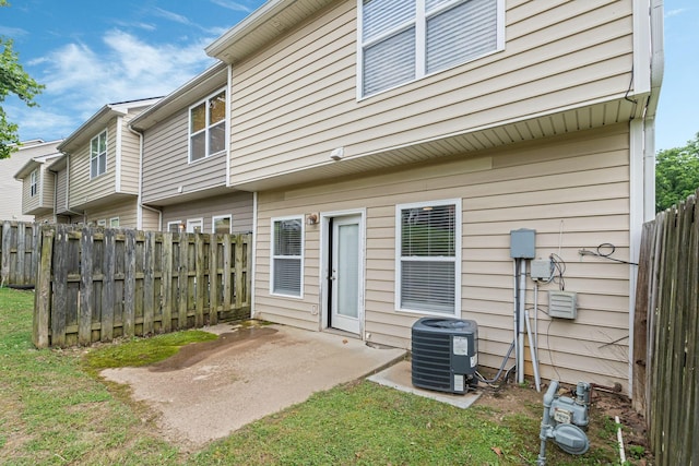 1515 Bridgecrest Dr Unit 220, Antioch, TN 37013 - rear view of house with central air condition unit and a patio