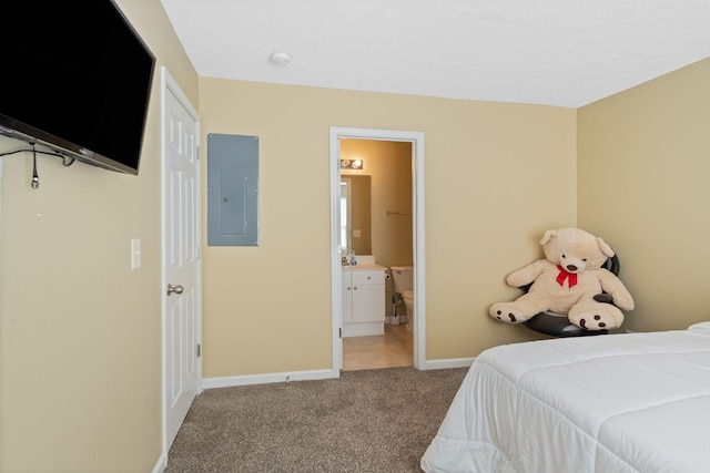 1515 Bridgecrest Dr Unit 220, Antioch, TN 37013 - carpeted bedroom with electric panel, baseboards, and ensuite bath