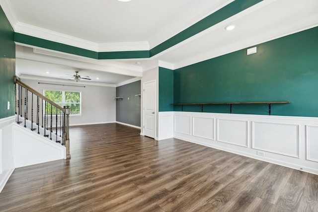 3211 Briar Chapel Dr, Murfreesboro, TN 37128 - empty room with ornamental molding, stairs, wainscoting, wood finished floors, and a ceiling fan