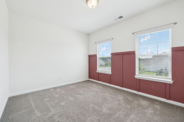 3211 Briar Chapel Dr, Murfreesboro, TN 37128 - carpeted spare room with wainscoting and baseboards