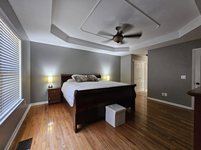 2524 Distillery Rd, Greenbrier, TN 37073 - bedroom featuring a tray ceiling, hardwood / wood-style floors, baseboards, and ceiling fan