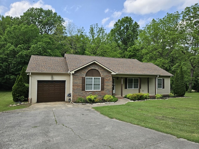 2524 Distillery Rd, Greenbrier, TN 37073 - ranch-style house featuring an attached garage, driveway, a front lawn, and roof with shingles