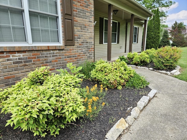 2524 Distillery Rd, Greenbrier, TN 37073 - property entrance featuring brick siding and covered porch