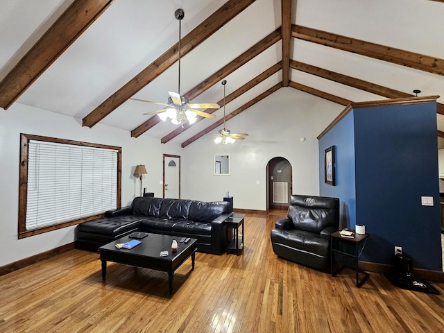2524 Distillery Rd, Greenbrier, TN 37073 - living room featuring arched walkways, ceiling fan, baseboards, and hardwood / wood-style floors