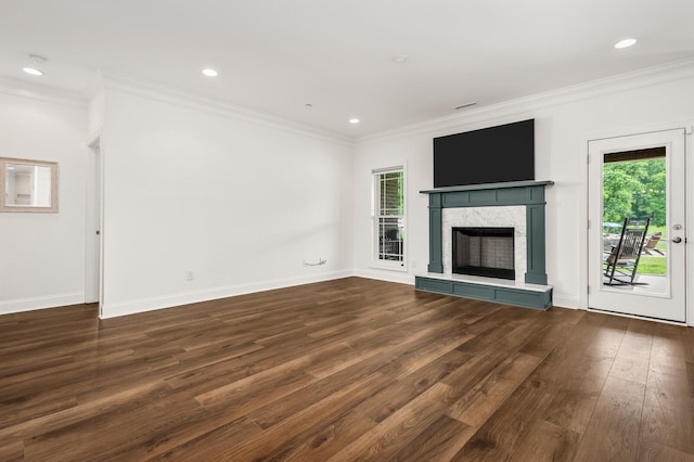 1705 Allisona Rd, Eagleville, TN 37060 - unfurnished living room with wood finished floors, ornamental molding, baseboards, a fireplace with raised hearth, and recessed lighting