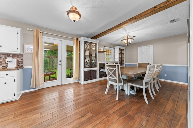 314 Millhouse Rd, Smyrna, TN 37167 - dining room featuring plenty of natural light, wood finished floors, beamed ceiling, a chandelier, and baseboards