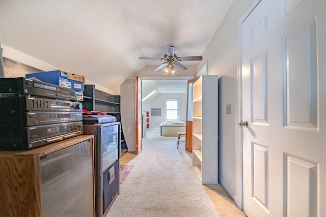 314 Millhouse Rd, Smyrna, TN 37167 - walk in closet featuring light colored carpet, vaulted ceiling, and ceiling fan