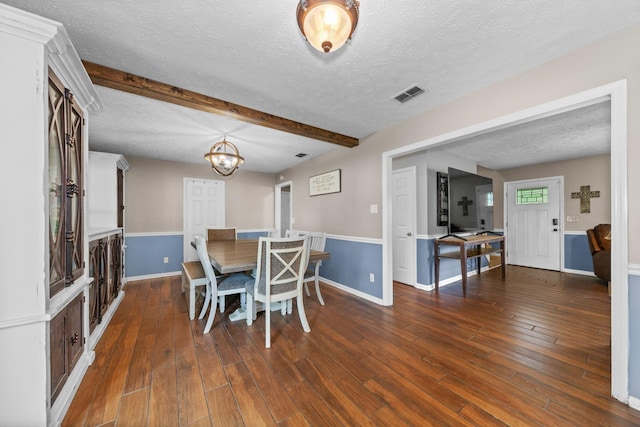 314 Millhouse Rd, Smyrna, TN 37167 - dining room featuring a textured ceiling, dark wood finished floors, a chandelier, baseboards, and beam ceiling